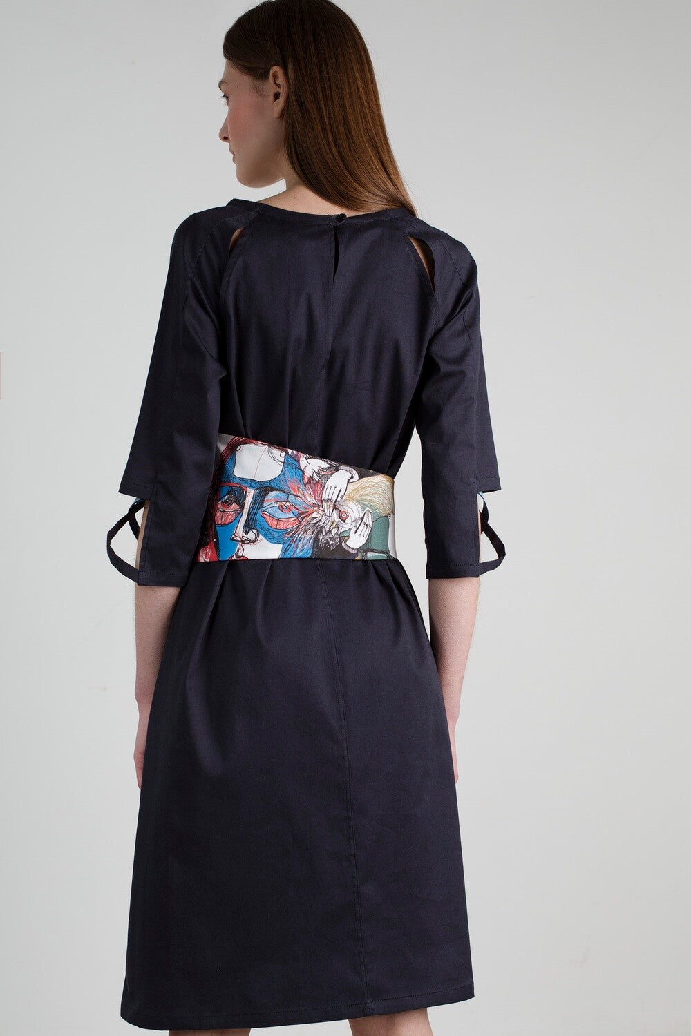 Dark blue dress with printed belt